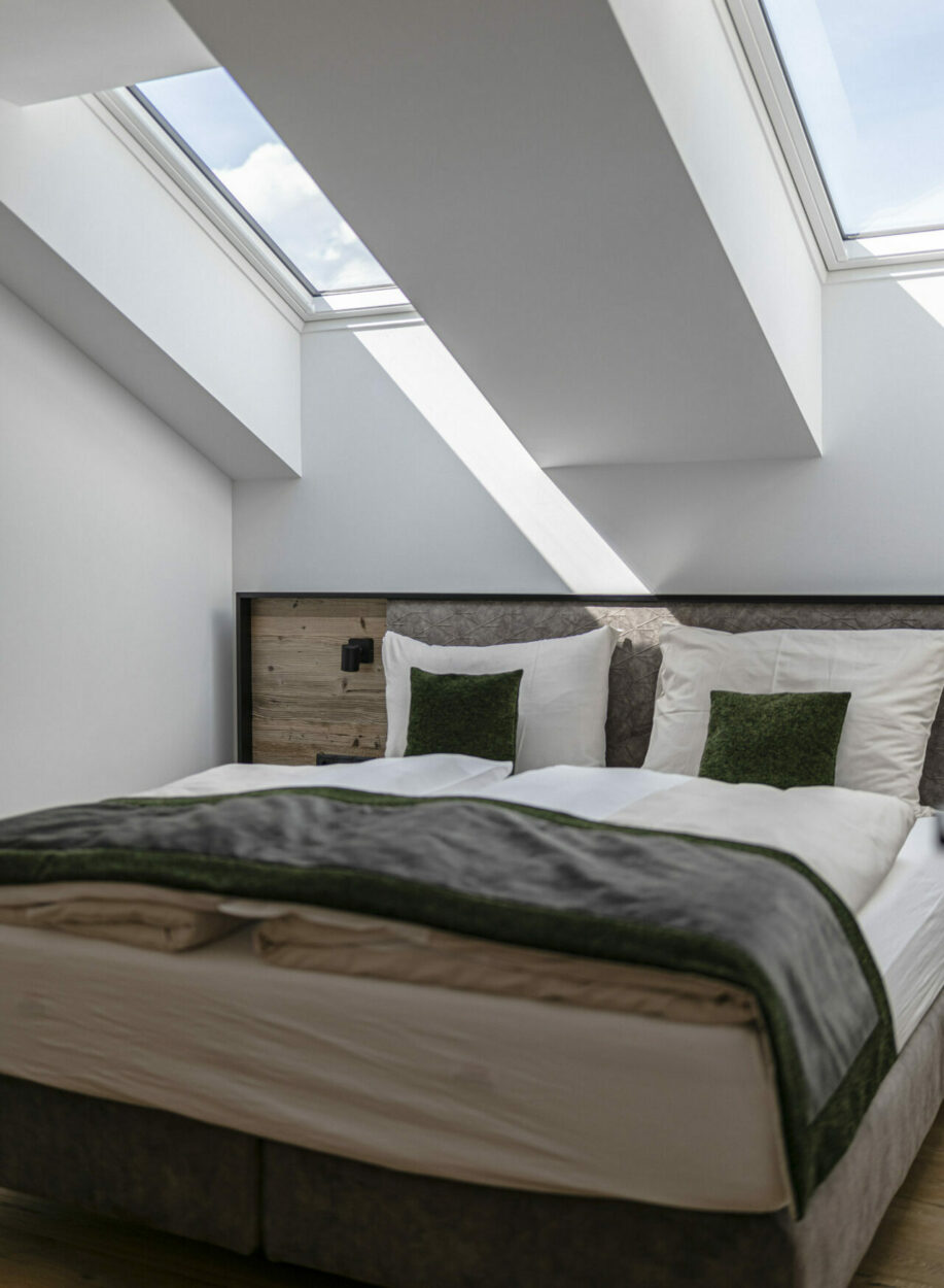 Apartmentresort Rauris mit Schlafzimmer. Innenansicht.